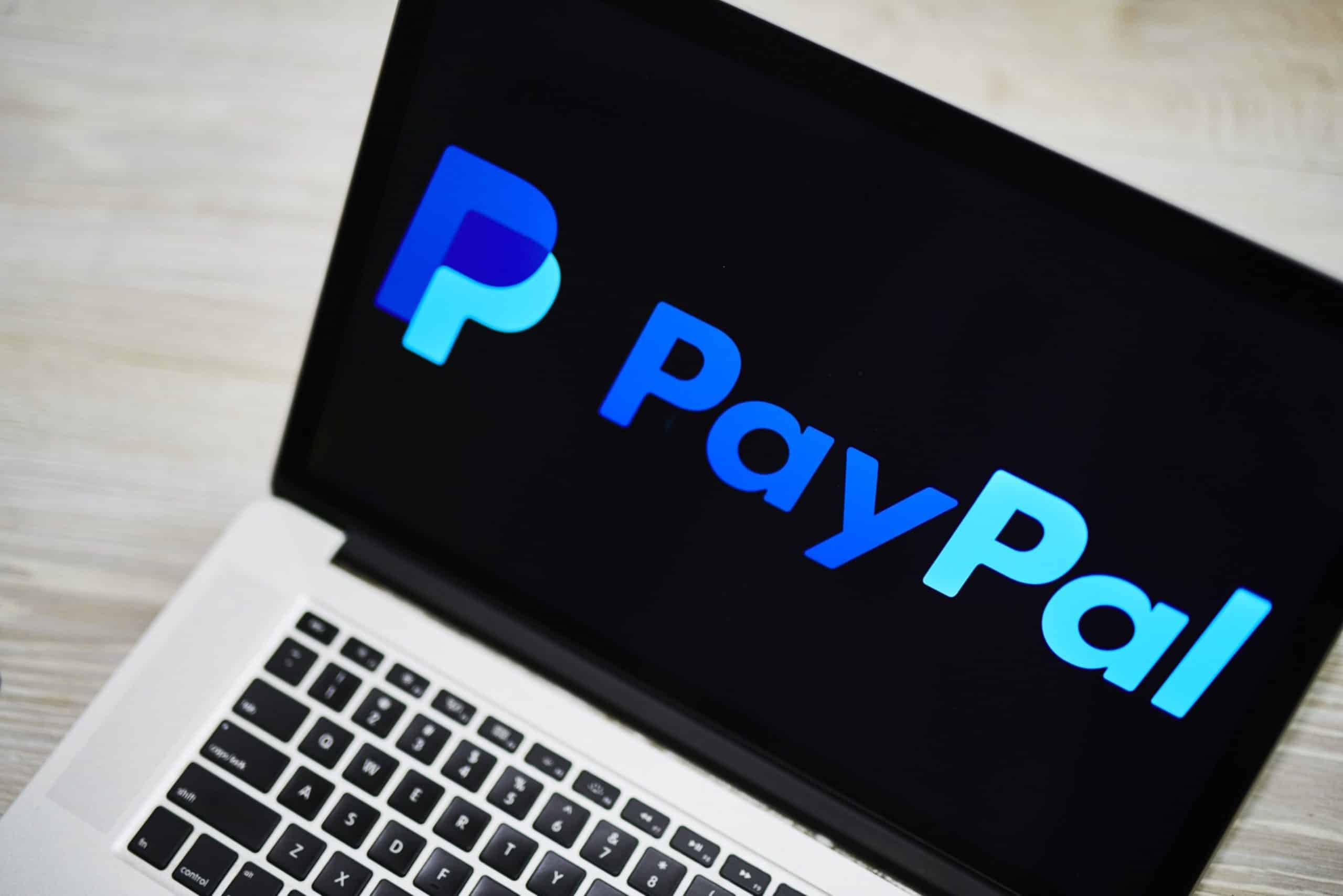 PayPal Holdings Inc. signage is displayed on an Apple Inc. laptop computer in an arranged photograph taken in Little Falls, New Jersey, U.S. Photographer: Gabby Jones/Bloomberg