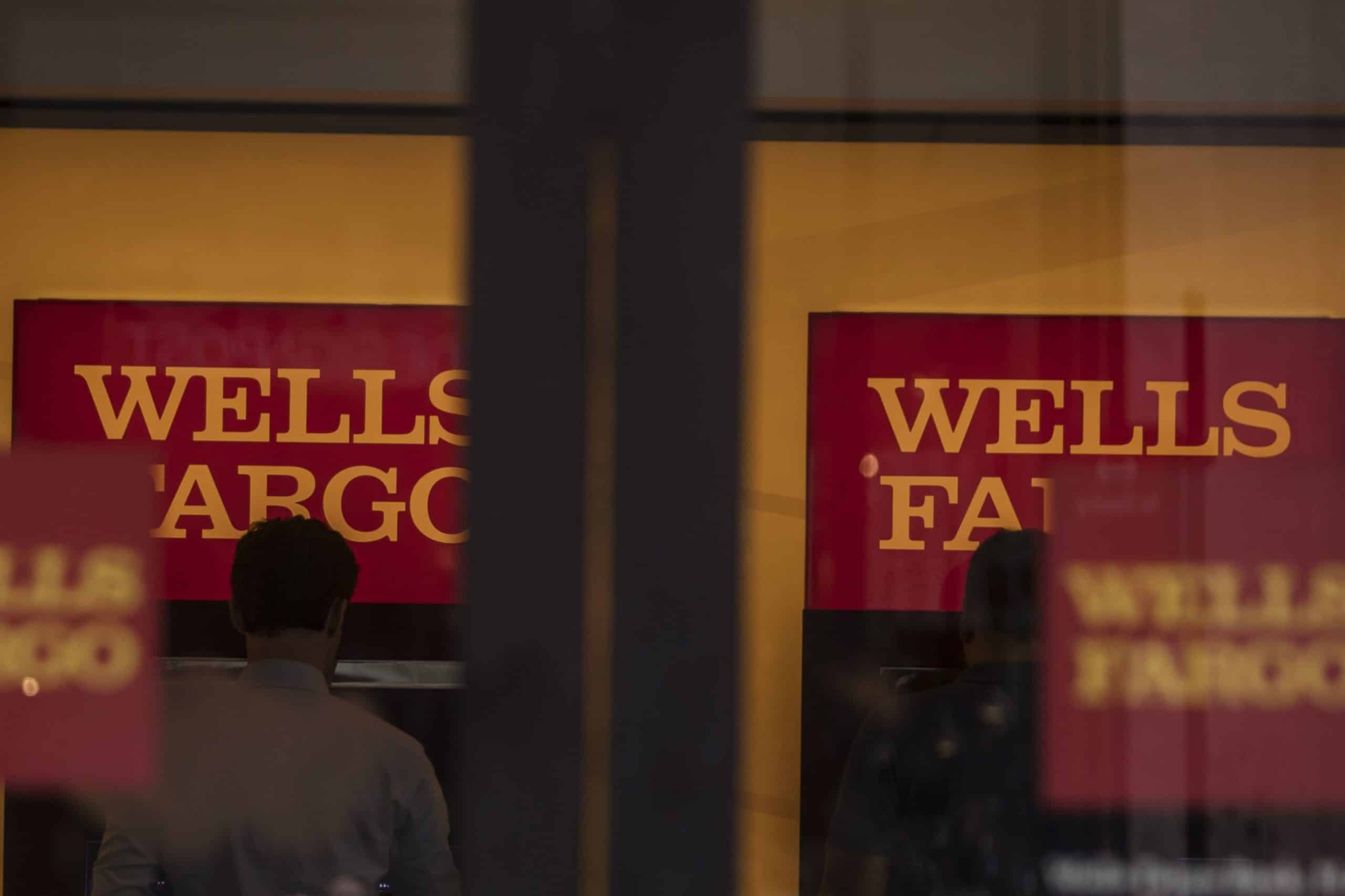 Customers use automatic teller machines (ATM) inside a Wells Fargo & Co. bank branch in New York, U.S., on Tuesday, July 2, 2019. Photographer: Victor J. Blue/Bloomberg