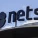 A Nets logo stands above the headquarters of Nets Holding A/S in Copenhagen, Denmark. Photographer: Freya Ingrid Morales/Bloomberg