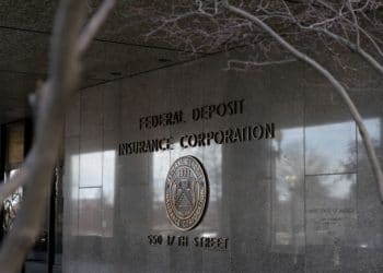 Signage hangs outside the Federal Deposit Insurance Corporation (FDIC) headquarters in Washington, D.C. Image: Andrew Harrer/Bloomberg