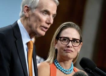 Rob Portman and Kyrsten Sinema/Photo by Bloomberg Mercury