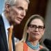Rob Portman and Kyrsten Sinema/Photo by Bloomberg Mercury