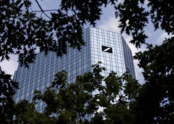 The Deutsche Bank AG logo sits on the bank's headquarters in Frankfurt, Germany, on Wednesday, July 25, 2018.