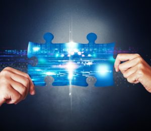 Two cyber puzzle pieces coming together