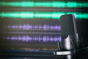 Microphone against background of sound waves