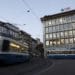 Trams pass by the UBS Group AG headquarters in Zurich, Switzerland, on Monday, Oct. 14, 2019. The spying scandal roiling Credit Suisse Group AG has also created a big headache at UBS a stone's throw away in