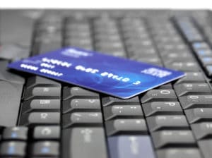 Credit card on computer keyboard