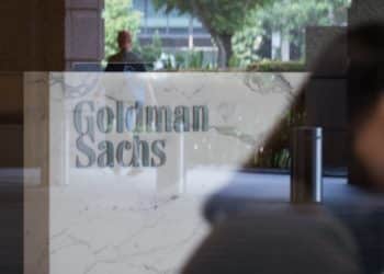 The Goldman Sachs Group Inc. logo is displayed in the reception area of the One Raffles Link building, which houses one of the Goldman Sachs (Singapore) Pte offices, in Singapore. Photographer: Nicky Loh/Bloomberg