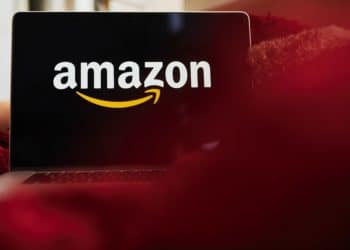 The logo for Amazon.com Inc. is displayed on an Apple Inc. laptop computer in an arranged photograph taken in the Brooklyn borough of New York, U.S., on Friday, April 10, 2020. Across the country, millions of consumers are turning to Amazon.com and other services to fill their fridges via online delivery rather than brave going to a supermarket because of shelter-in-place declarations during the coronavirus pandemic. Photographer: Gabby Jones/Bloomberg