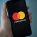 The MasterCard Inc. logo on a smartphone. Photographer: Gabby Jones/Bloomberg