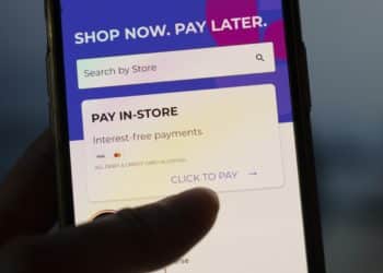 Rely, a buy now pay later app, is displayed on an iPhone in Singapore on Sunday, June 6, 2021. Photographer: Wei Leng Tay/Bloomberg