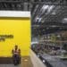 A worker takes a break at the MercadoLibre fulfillment center on Black Friday in Sao Paulo, Brazil, on Friday, Nov. 26, 2021. After a 2-year period in which Brazilians have greatly matured when it comes to online shopping, e-commerce platforms are ready for Black Friday.