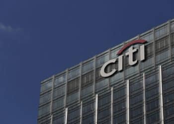 A Citi logo sits outside the offices of Citigroup Inc. in the Canary Wharf business, financial and shopping district of London, U.K., on Tuesday, April 8, 2014.  Photographer: Chris Ratcliffe/Bloomberg