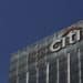 A Citi logo sits outside the offices of Citigroup Inc. in the Canary Wharf business, financial and shopping district of London, U.K., on Tuesday, April 8, 2014. Photographer: Chris Ratcliffe/Bloomberg