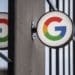 A logo outside the Google Store Chelsea in New York, U.S., on Friday, May 28, 2021. The Google Store will display and sell a variety of product such as Pixel phones, Nest smart home devices, Fitbit trackers, Pixelbooks, and more. Photographer: Victor J. Blue/Bloomberg