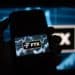 The FTX Cryptocurrency Derivatives Exchange logo on a digital device arranged in Riga, Latvia, Nov. 24, 2022. The implosion of Sam Bankman-Frieds FTX empire dealt a harsh blow to the Bahamas ambitions to be a hub for the crypto industry, and its causing massive pain for locals who treated the now-bankrupt exchange like a bank. Photographer: Andrey Rudakov/Bloomberg