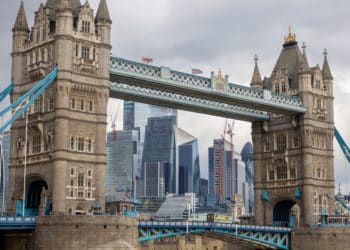 Tower Bridge in London frames skyscrapers and buildings on the City of London skyline, U.K on Monday, March 6, 2023. Photographer: Jason Alden/Bloomberg
