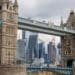 Tower Bridge in London frames skyscrapers and buildings on the City of London skyline, U.K on Monday, March 6, 2023. Photographer: Jason Alden/Bloomberg