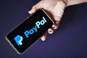 PayPal Holdings Inc. signage is displayed on an Apple Inc. iPhone in an arranged photograph taken in Little Falls, New Jersey, U.S., on Saturday, July 20, 2019. Paypal Holdings Inc. is scheduled to release earnings figures on July 24. PayPal Holdings Inc. signage is displayed on an Apple Inc. iPhone in an arranged photograph taken in Little Falls, New Jersey, U.S., on Saturday, July 20, 2019. Paypal Holdings Inc. is scheduled to release earnings figures on July 24.