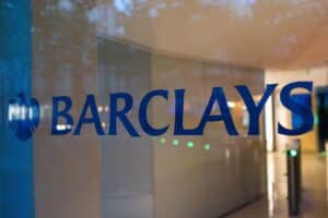 A logo at the entrance to the Barclays Plc French headquarters in Paris, France, on Wednesday, May 17, 2023. Barclays expects to increase its headcount in Paris by about two thirds in the next two to three years, as the French capital increasingly becomes the main trading hub in continental Europe for global lenders after Brexit.