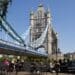 Visitors sit at restaurant tables against a backdrop of Tower Bridge in London, UK, on Saturday, June 10, 2023. Soaring temperatures caused by a blast of hot air led the UK to post fresh health warnings through the weekend. Photographer: Chris Ratcliffe/Bloomberg