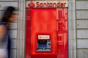 An automated teller machine (ATM) outside a Banco Santander SA bank branch in Madrid, Spain, on Wednesday, July 26, 2023. Banco Santanders earnings beat estimates as its domestic market became the Spanish lenders top profit maker for the first time in more than a decade, boosted by rising interest rates. Photographer: Paul Hanna/Bloomberg