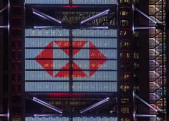 The HSBC Holdings Plc logo is displayed on the facade of the company's headquarters in Hong Kong, China, on Friday, Feb. 18, 2022. HSBC is scheduled to release earnings results on Feb. 22. Photographer: Paul Yeung/Bloomberg