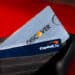 Capital One and Discover credit cards arranged in Rhinebeck, New York, US, on Tuesday, Feb. 20, 2024. Capital One Financial Corp. agreed to buy Discover Financial Services in a $35 billion all-stock deal to create the largest US credit card company by loan volume, giving the combined entity a stronger foothold to compete with Wall Streets behemoths.