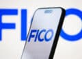 The Fair Isaac Corp. (FICO) logo displayed on a smartphone screen, on April 23, 2025.