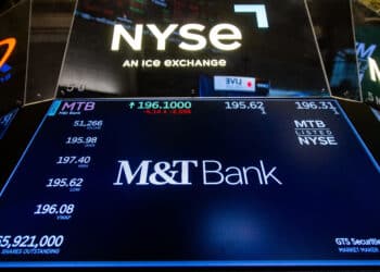 M&T Bank Corp. signage on the floor of the New York Stock Exchange (NYSE) in New York, US, on Monday, Feb. 3, 2025. US stock index futures declined on Monday after US President Donald Trump announced tariffs on Mexico, Canada and China that threaten to upend global trade. Photographer: Michael Nagle/Bloomberg