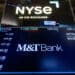M&T Bank Corp. signage on the floor of the New York Stock Exchange (NYSE) in New York, US, on Monday, Feb. 3, 2025. US stock index futures declined on Monday after US President Donald Trump announced tariffs on Mexico, Canada and China that threaten to upend global trade. Photographer: Michael Nagle/Bloomberg