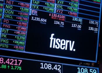 Fiserv Inc. signage on the floor of the New York Stock Exchange.