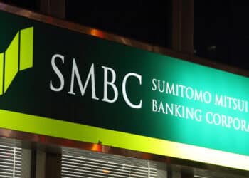 Signage for Sumitomo Mitsui Banking Corp. is displayed outside one of the company's branches in Tokyo, Japan, on Monday, Jan. 26, 2015. Sumitomo Mitsui Financial Group Inc. is expected to announce its third-quarter earnings on Jan. 27. Photographer: Tomohiro Ohsumi/Bloomberg