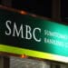 Signage for Sumitomo Mitsui Banking Corp. is displayed outside one of the company's branches in Tokyo, Japan, on Monday, Jan. 26, 2015. Sumitomo Mitsui Financial Group Inc. is expected to announce its third-quarter earnings on Jan. 27. Photographer: Tomohiro Ohsumi/Bloomberg