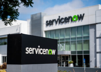Signage outside the ServiceNow headquarters in Santa Clara, California, US, on Thursday, Sept. 4, 2025. ServiceNow Inc. is offering federal agencies discounts of as much as 70% on its software, a move aimed at spurring adoption as the Trump administration presses for faster government implementation of artificial intelligence tools. Photographer: David Paul Morris/Bloomberg