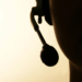 silhouette of a person wearing a call center headset