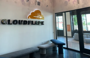 Interior of a Cloudflare office building with signage