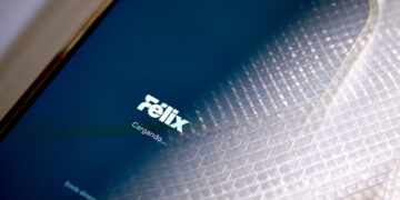 the Felix Pago WhatsApp-based digital app on a mobile phone
