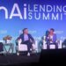 Four panelists on a stage with a large sign reading "FinAi Lending Summit" behind them